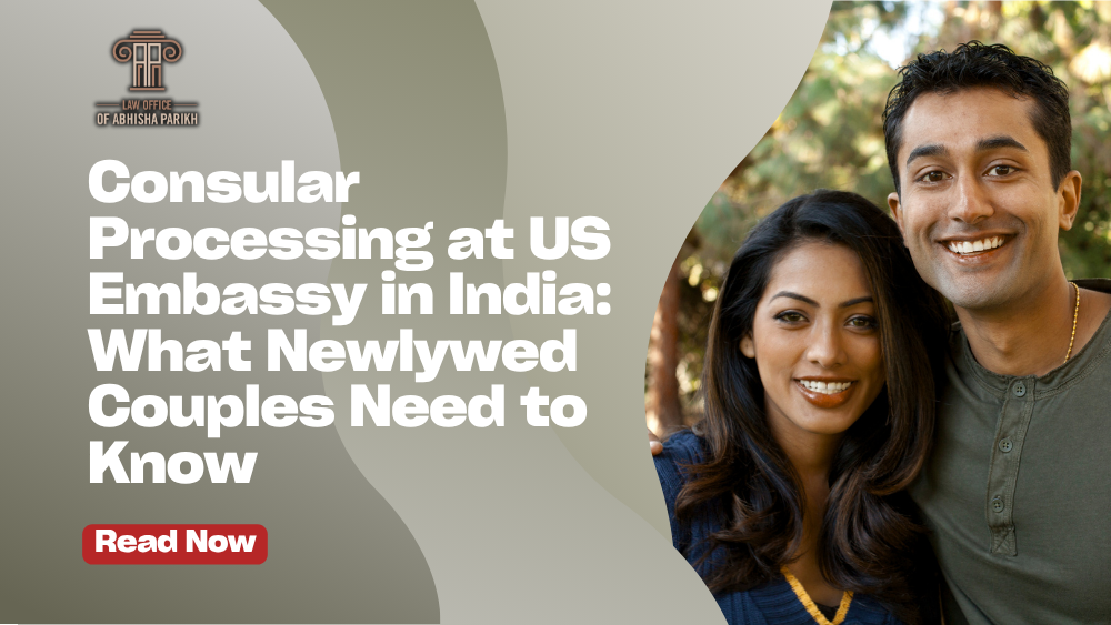 Blog banner showing a newlywed Indian couple at the U.S. Embassy in India holding a passport and immigrant visa application packet beside the text, “Consular Processing at US Embassy in India: What Newlywed Couples Need to Know.”