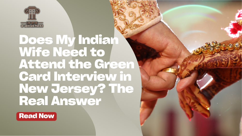 Indian couple attending a marriage-based green card interview in New Jersey with an immigration officer, illustrating whether an Indian wife must attend the green card interview.